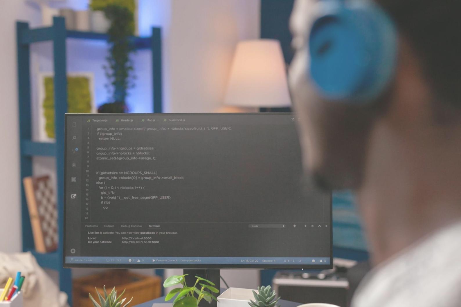 Technical support team reviewing mobile application performance metrics